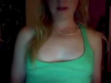 Blonde teen masturbates with hairbrush on Skype chat