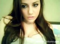 Brunette teen caught mastrurbating on webcam